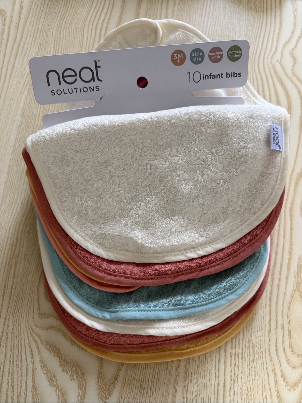 Neat Solutions Infant Bibs - Cream and Multicolor Set